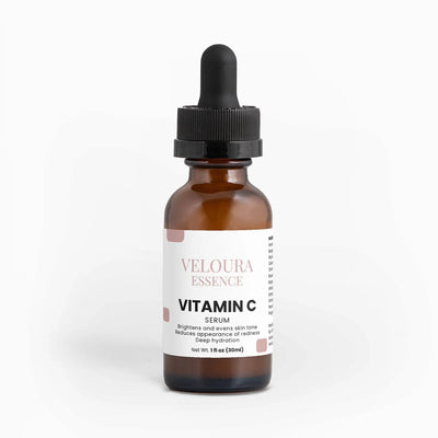 Veloura Essence Vitamin C Serum bottle with dropper on a white background
